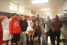 The Hughes Springs students competing in powerlifting this year gather in the hallway before practice. 